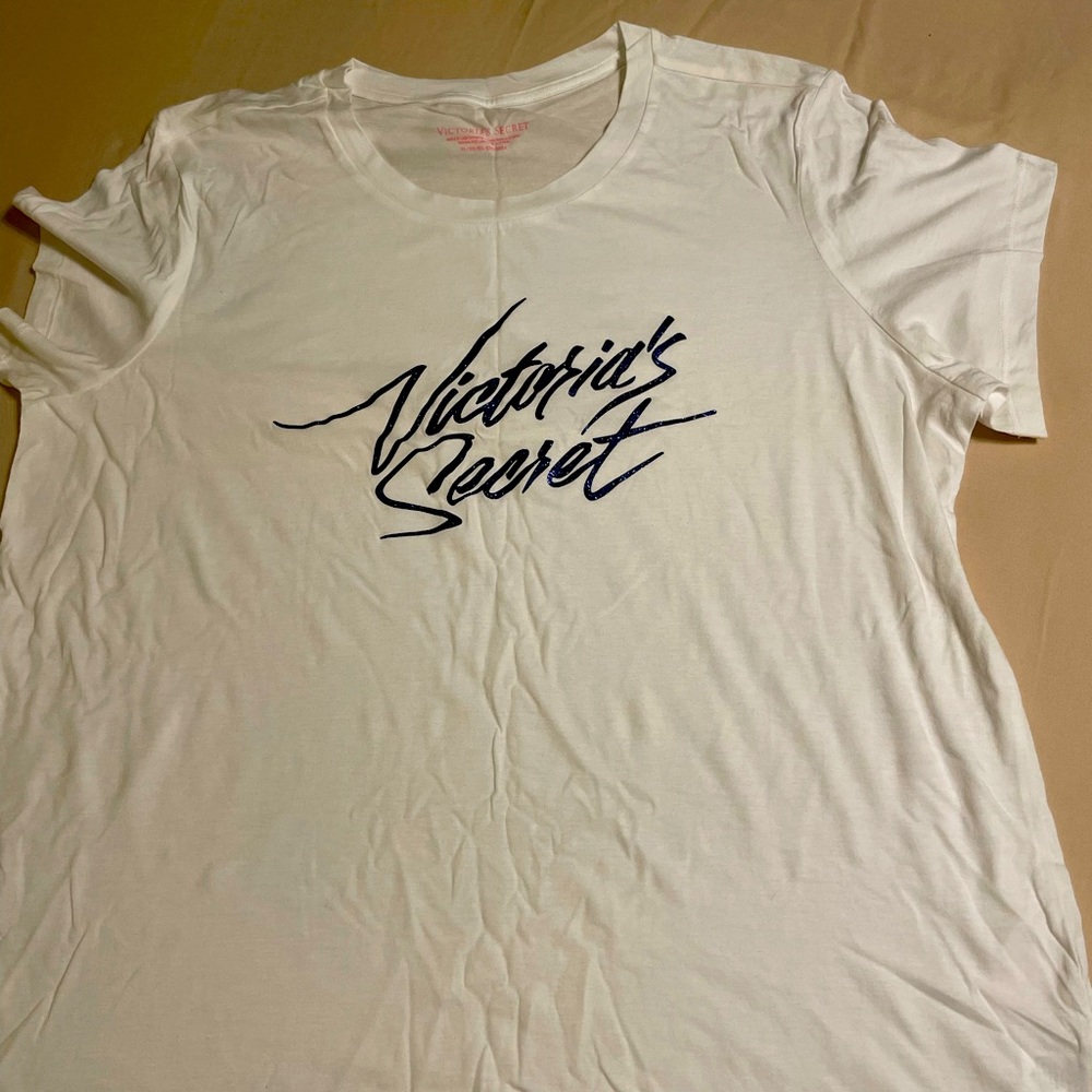Victoria’s Secret White T-Shirt with blue sparkle logo in the front